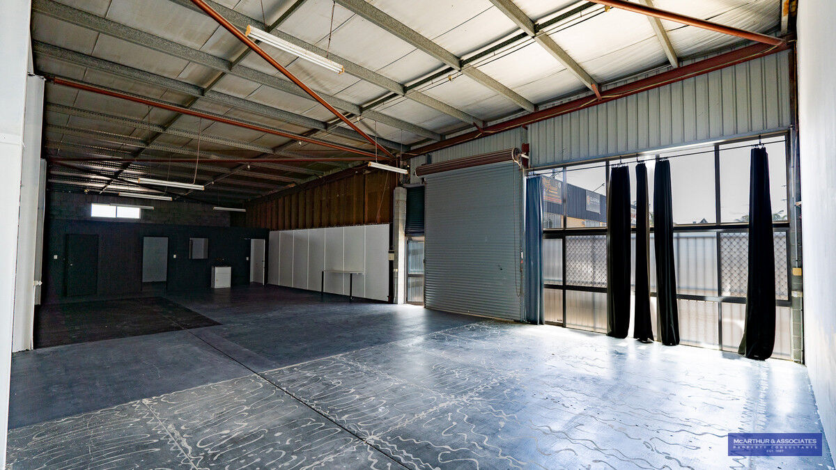WAREHOUSE IN BUSY INDUSTRIAL ESTATE LAWNTON McArthur & Associates