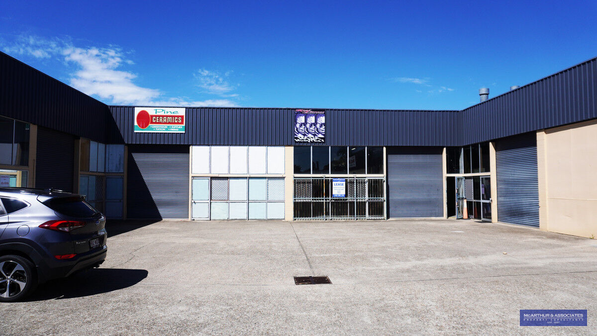WAREHOUSE IN BUSY INDUSTRIAL ESTATE LAWNTON McArthur & Associates