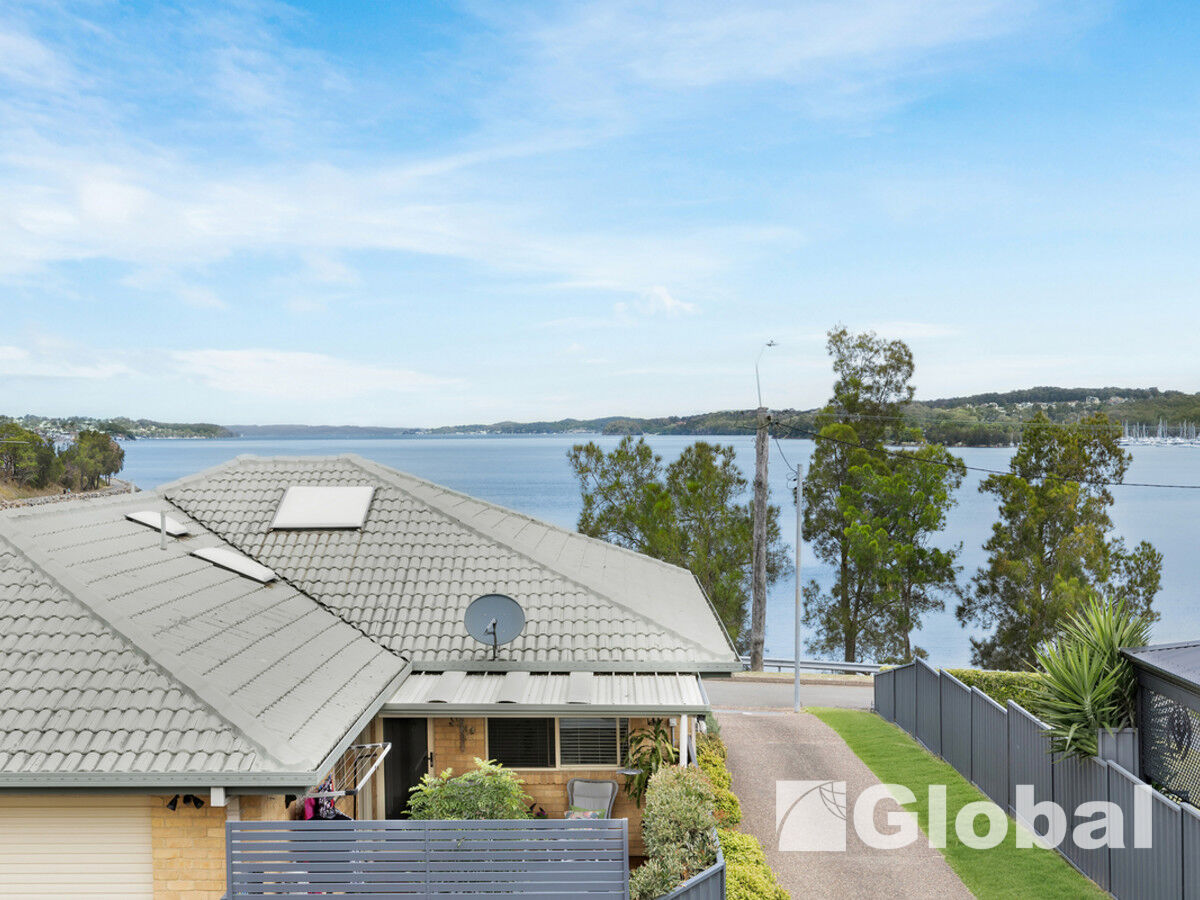Stunning Lakeside Haven - Global Property