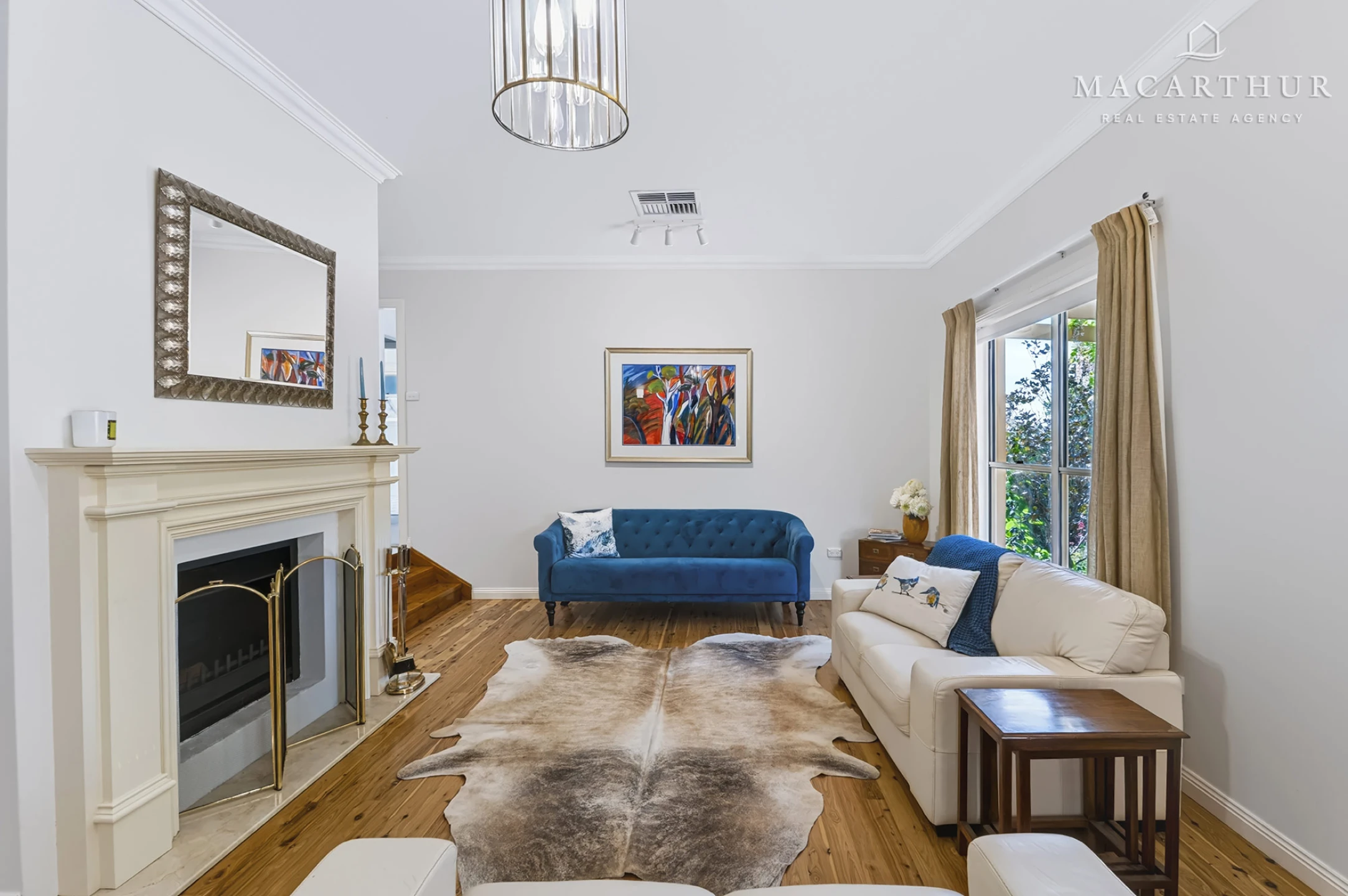Lounge with fireplace at 2 Casuarina Place